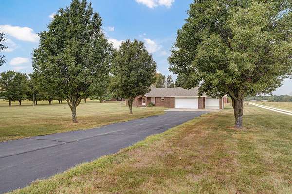 5 Acres of Residential Land with Home for Sale in Strafford, Missouri