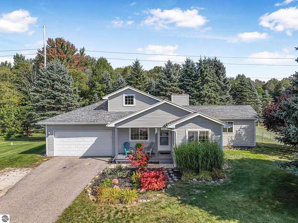 1.75 Acres of Residential Land with Home for Sale in Traverse City, Michigan