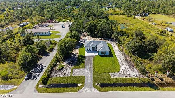 2.27 Acres of Residential Land with Home for Sale in Naples, Florida