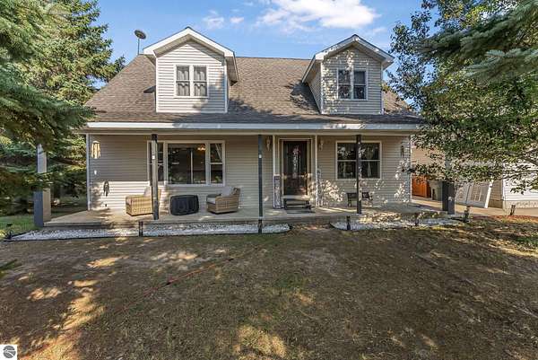 2.8 Acres of Residential Land with Home for Sale in Manton, Michigan