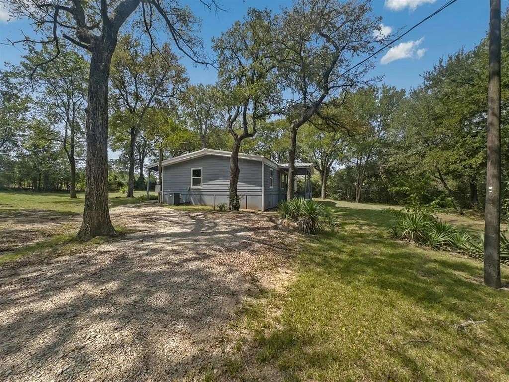 2 Acres of Residential Land with Home for Sale in Bells, Texas