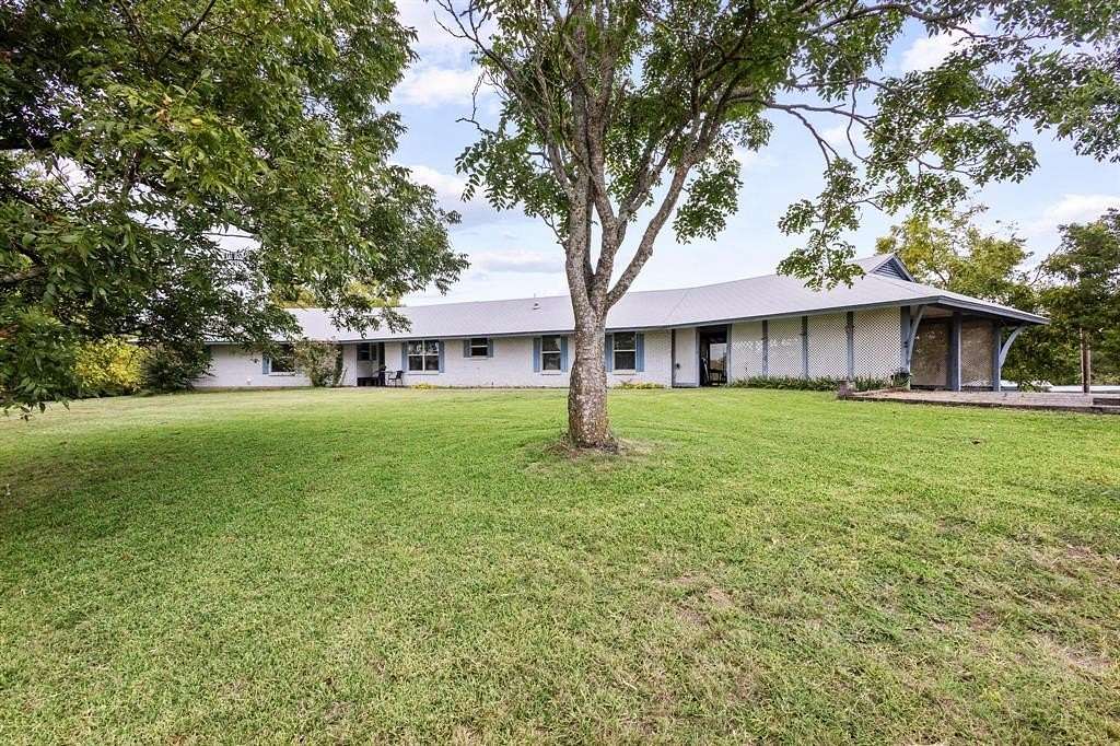 5 Acres of Residential Land with Home for Sale in Windom, Texas