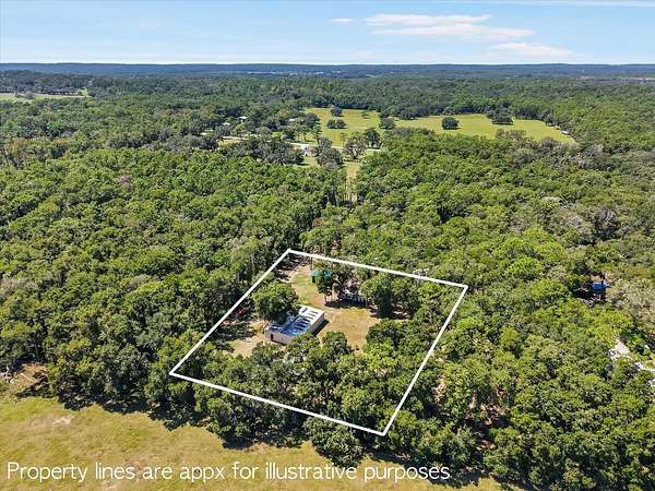 2.5 Acres of Residential Land with Home for Sale in Brooksville, Florida