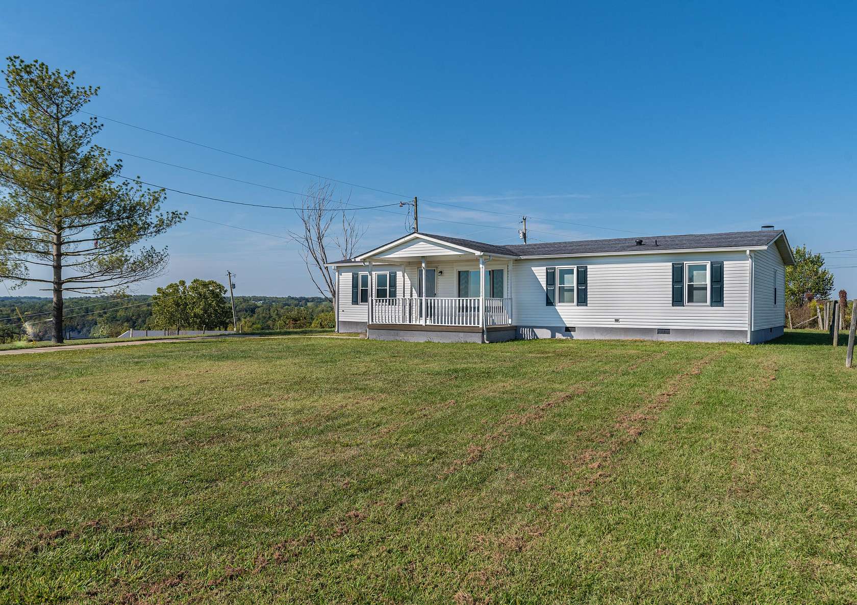 3.89 Acres of Residential Land with Home for Sale in Sanders, Kentucky