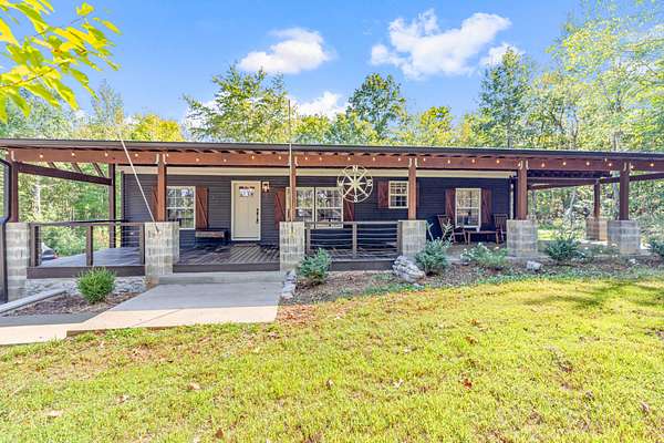 5.33 Acres of Residential Land with Home for Sale in McEwen, Tennessee