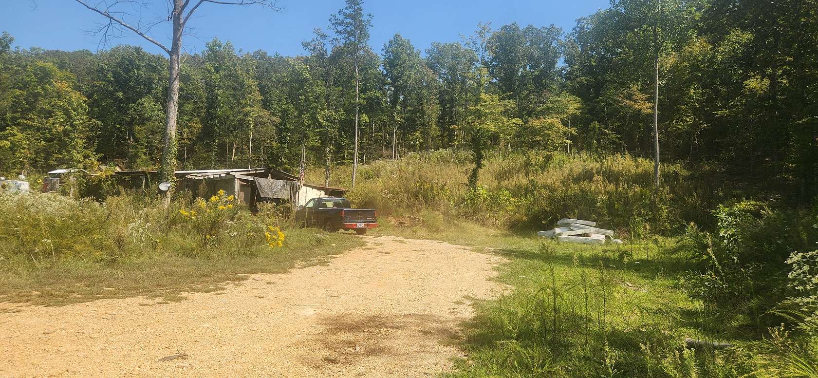 5.28 Acres of Residential Land with Home for Sale in Nunnelly, Tennessee