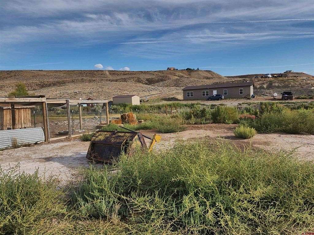 35.2 Acres of Land with Home for Sale in Hotchkiss, Colorado