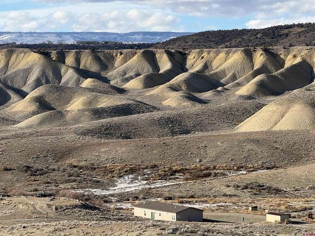 35.2 Acres of Land with Home for Sale in Hotchkiss, Colorado