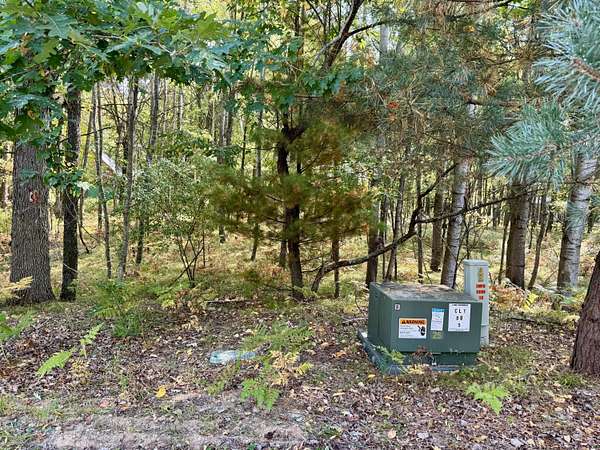 0.85 Acres of Residential Land for Sale in Canadian Lakes, Michigan