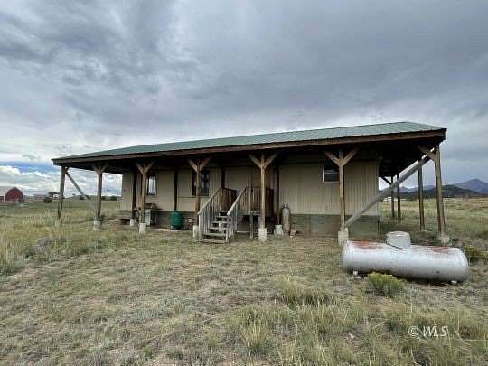 2.59 Acres of Land with Home for Sale in Cotopaxi, Colorado