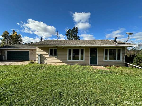 5.75 Acres of Residential Land with Home for Sale in Republic, Michigan