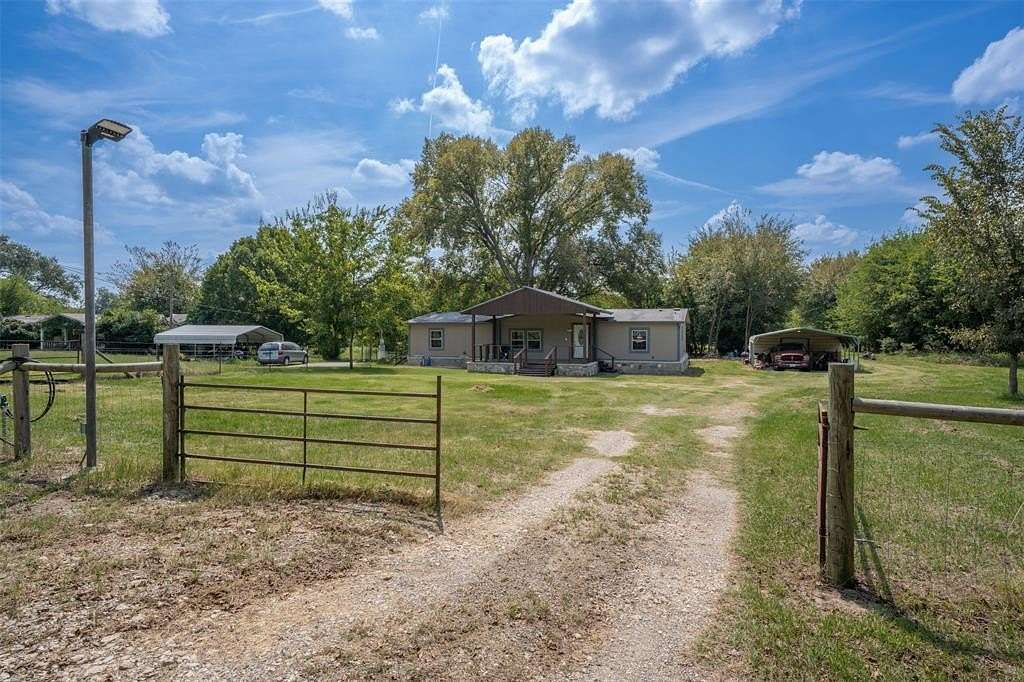 1.8 Acres of Residential Land with Home for Sale in Quinlan, Texas