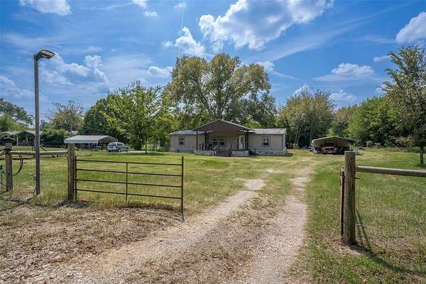 1.8 Acres of Residential Land with Home for Sale in Quinlan, Texas