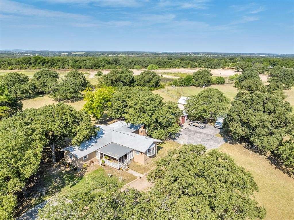4 Acres of Residential Land with Home for Sale in Comanche, Texas