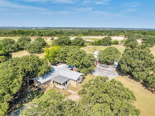 4 Acres of Residential Land with Home for Sale in Comanche, Texas