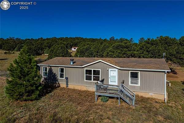 2.38 Acres of Residential Land with Home for Sale in Cotopaxi, Colorado