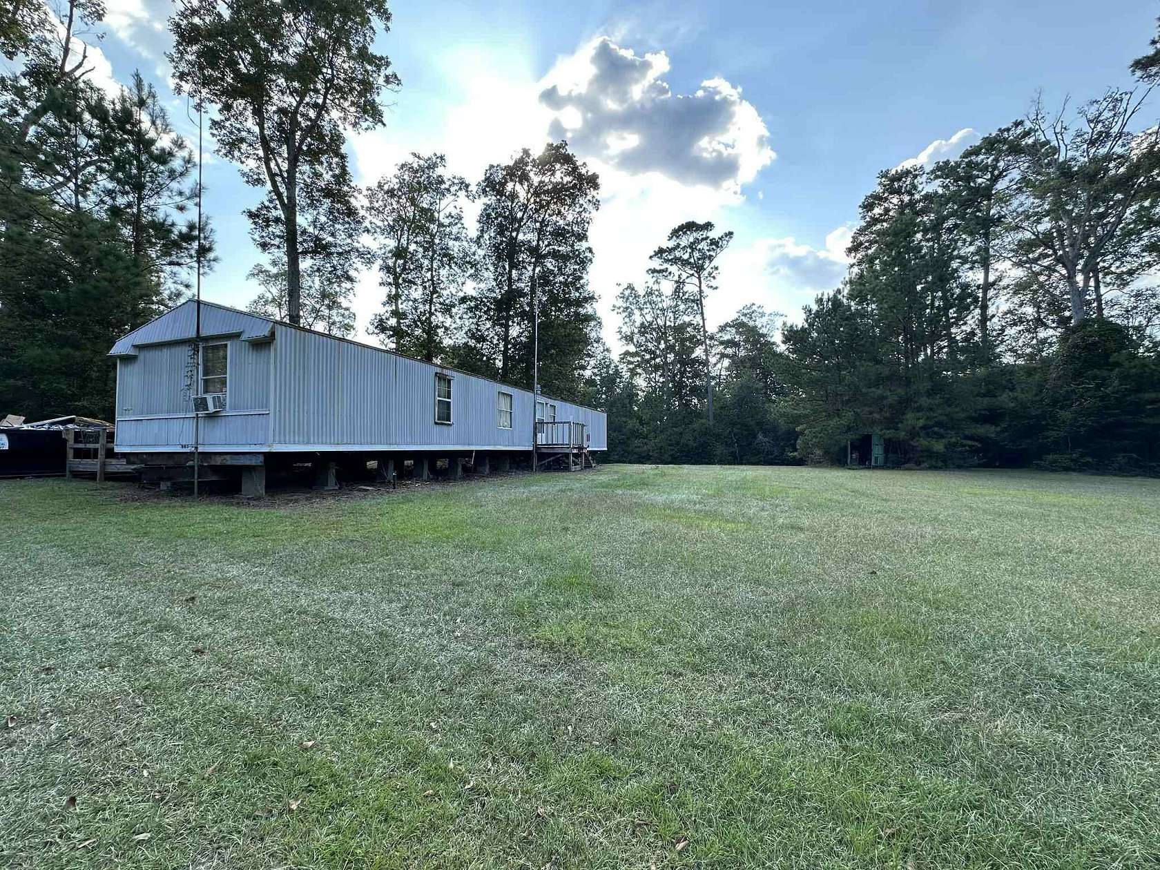 6.33 Acres of Residential Land with Home for Sale in Spurger, Texas