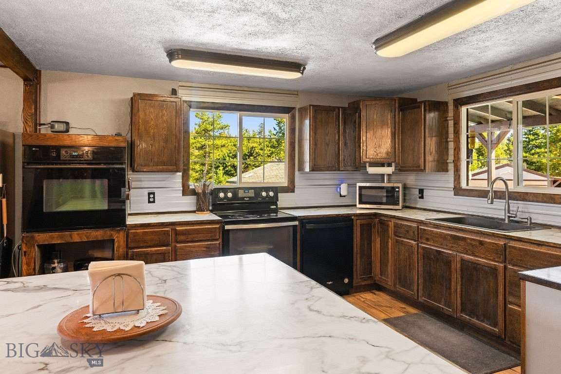 10.4 Acres of Land with Home for Sale in Butte, Montana