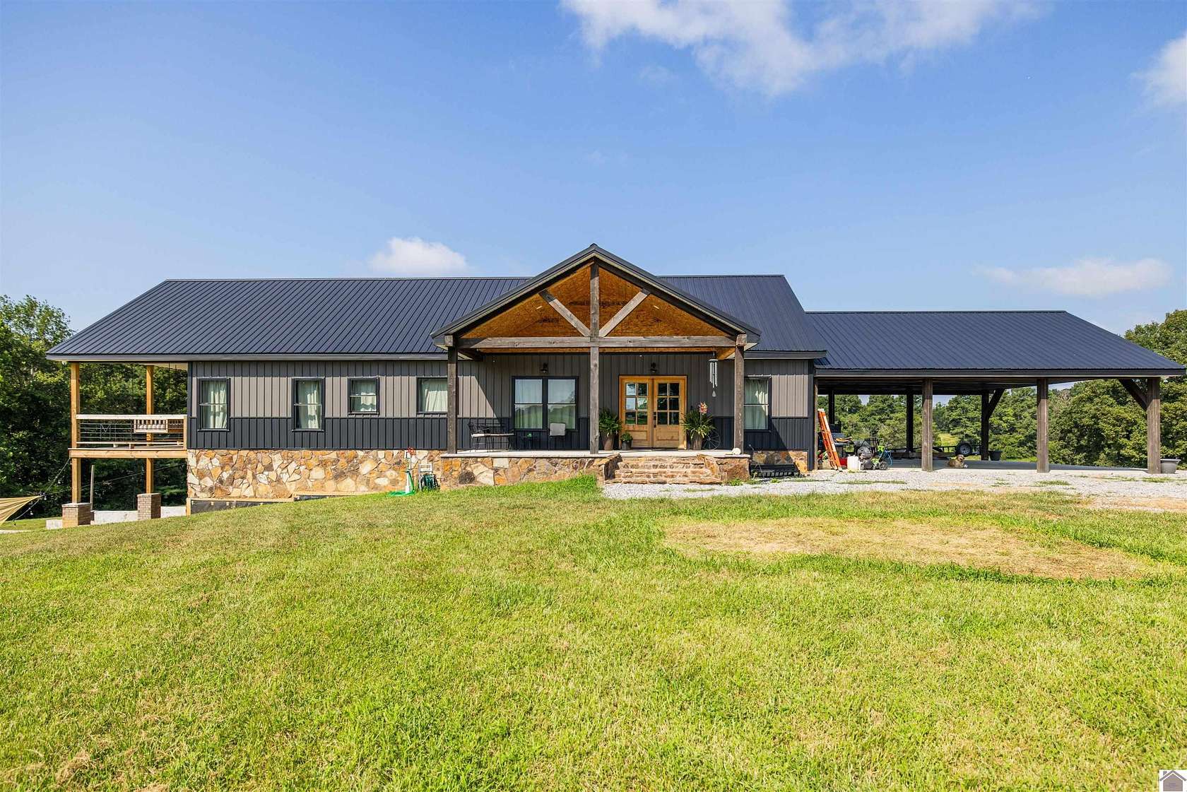 55.7 Acres of Land with Home for Sale in Benton, Kentucky