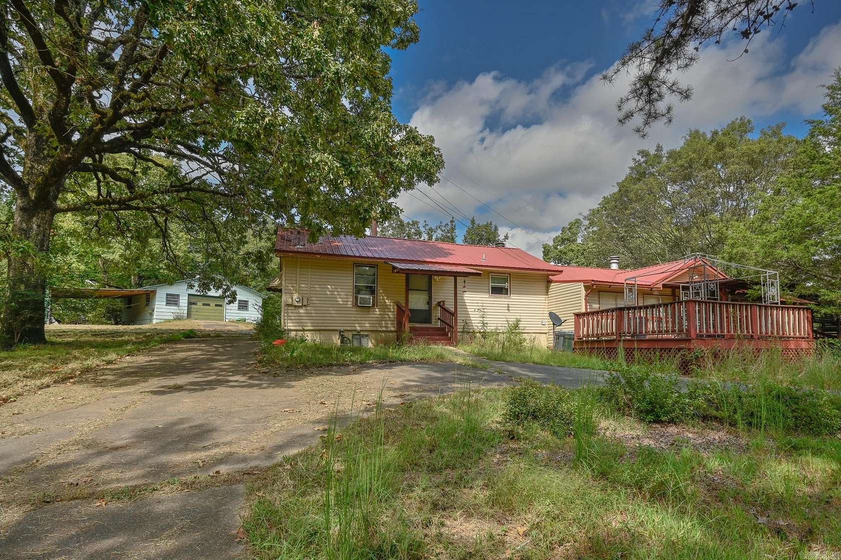 3.69 Acres of Land with Home for Sale in Mena, Arkansas