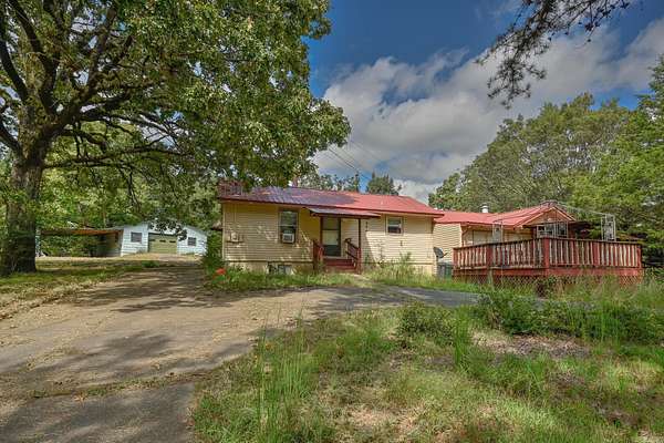 3.69 Acres of Land with Home for Sale in Mena, Arkansas