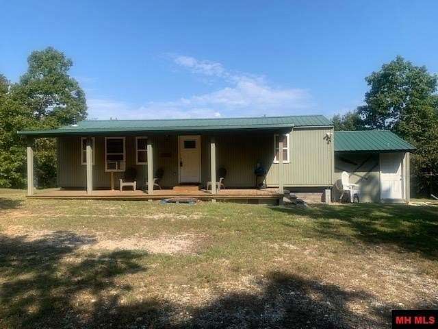6.72 Acres of Land with Home for Sale in Yellville, Arkansas