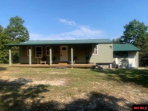 6.72 Acres of Land with Home for Sale in Yellville, Arkansas