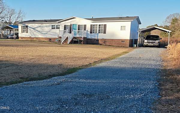 1.63 Acres of Residential Land with Home for Sale in Coats, North Carolina