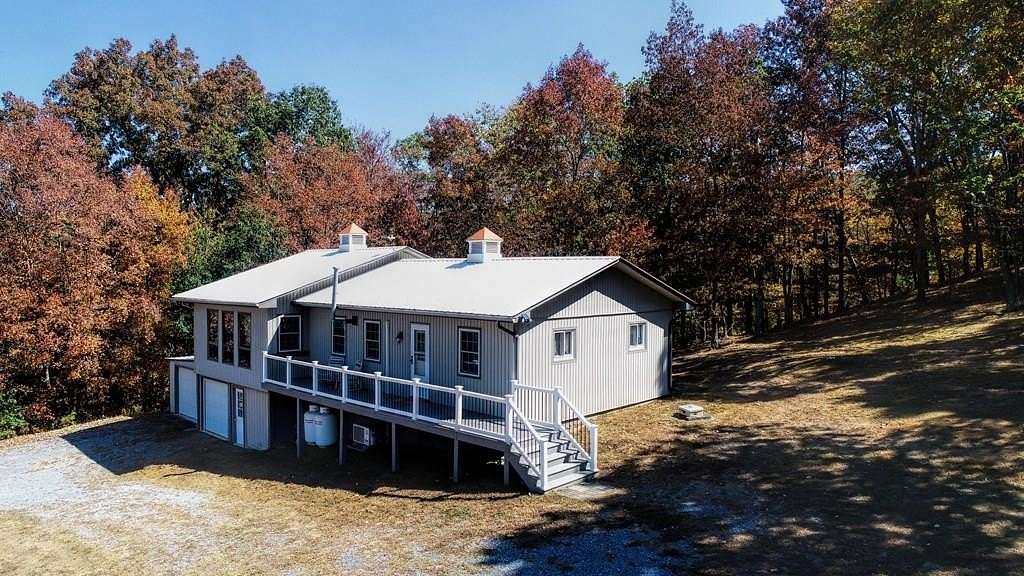 2.3 Acres of Land with Home for Sale in James Creek, Pennsylvania