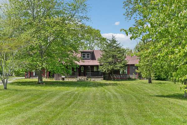 7.76 Acres of Residential Land with Home for Sale in Orlinda, Tennessee