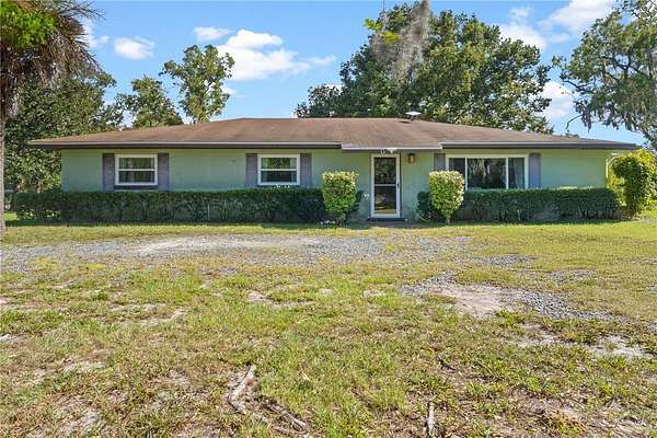 4.9 Acres of Land with Home for Sale in Morriston, Florida
