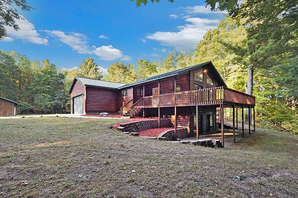 16.9 Acres of Land with Home for Sale in Grant, Michigan