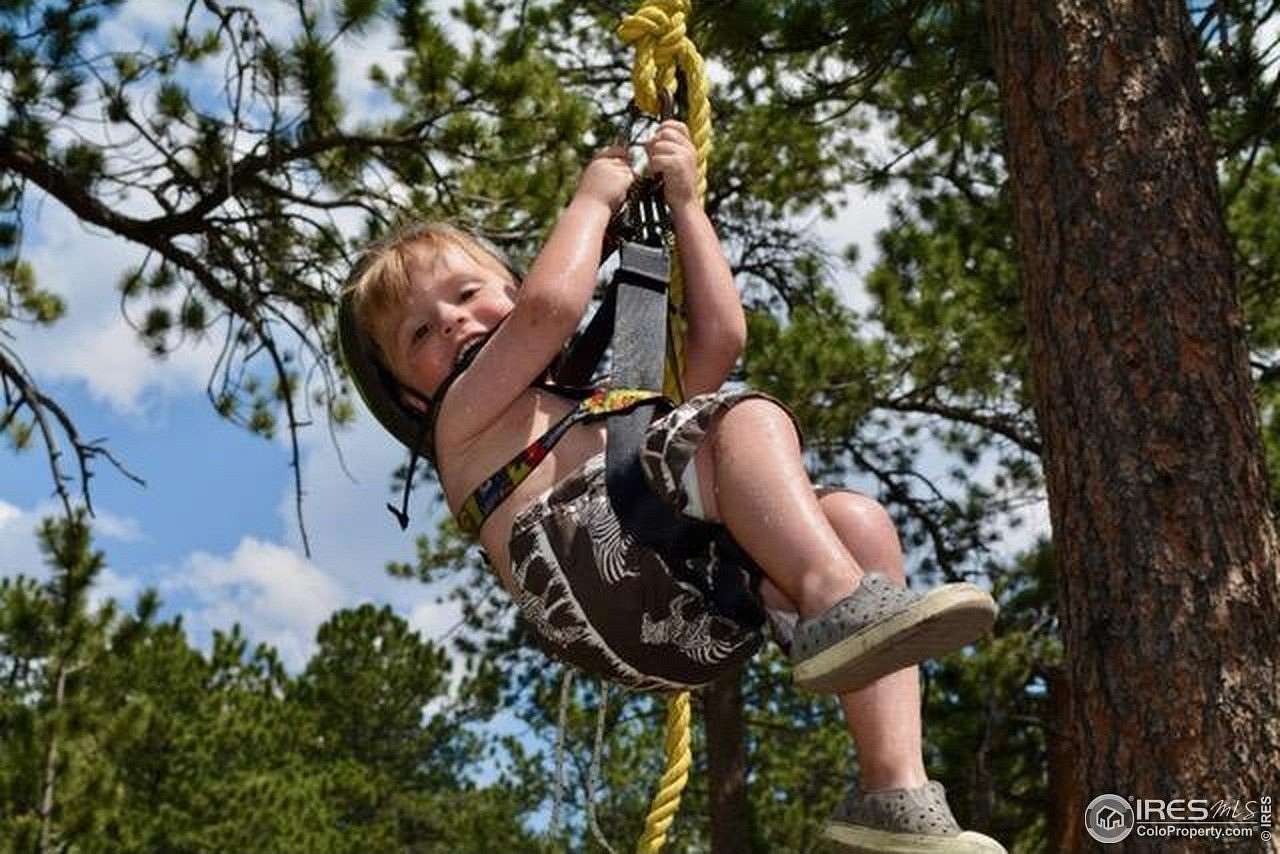 5.44 Acres of Residential Land with Home for Sale in Allenspark, Colorado