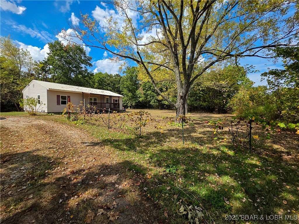 7.4 Acres of Residential Land with Home for Sale in Stover, Missouri