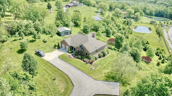 5.47 Acres of Residential Land with Home for Sale in Petersburg, Kentucky