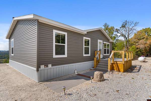 8 Acres of Land with Home for Sale in Mountain Home, Arkansas