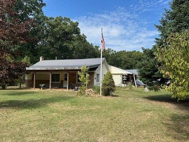 3 Acres of Land with Home for Sale in Twin Lake, Michigan