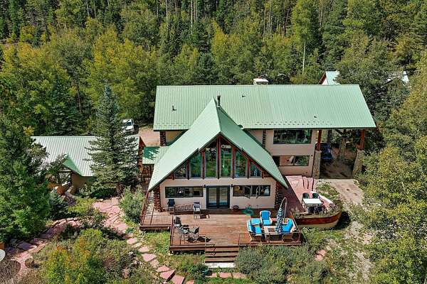 14.7 Acres of Recreational Land with Home for Sale in Angel Fire, New Mexico