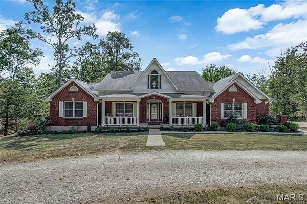 11.4 Acres of Recreational Land with Home for Sale in Warrenton, Missouri