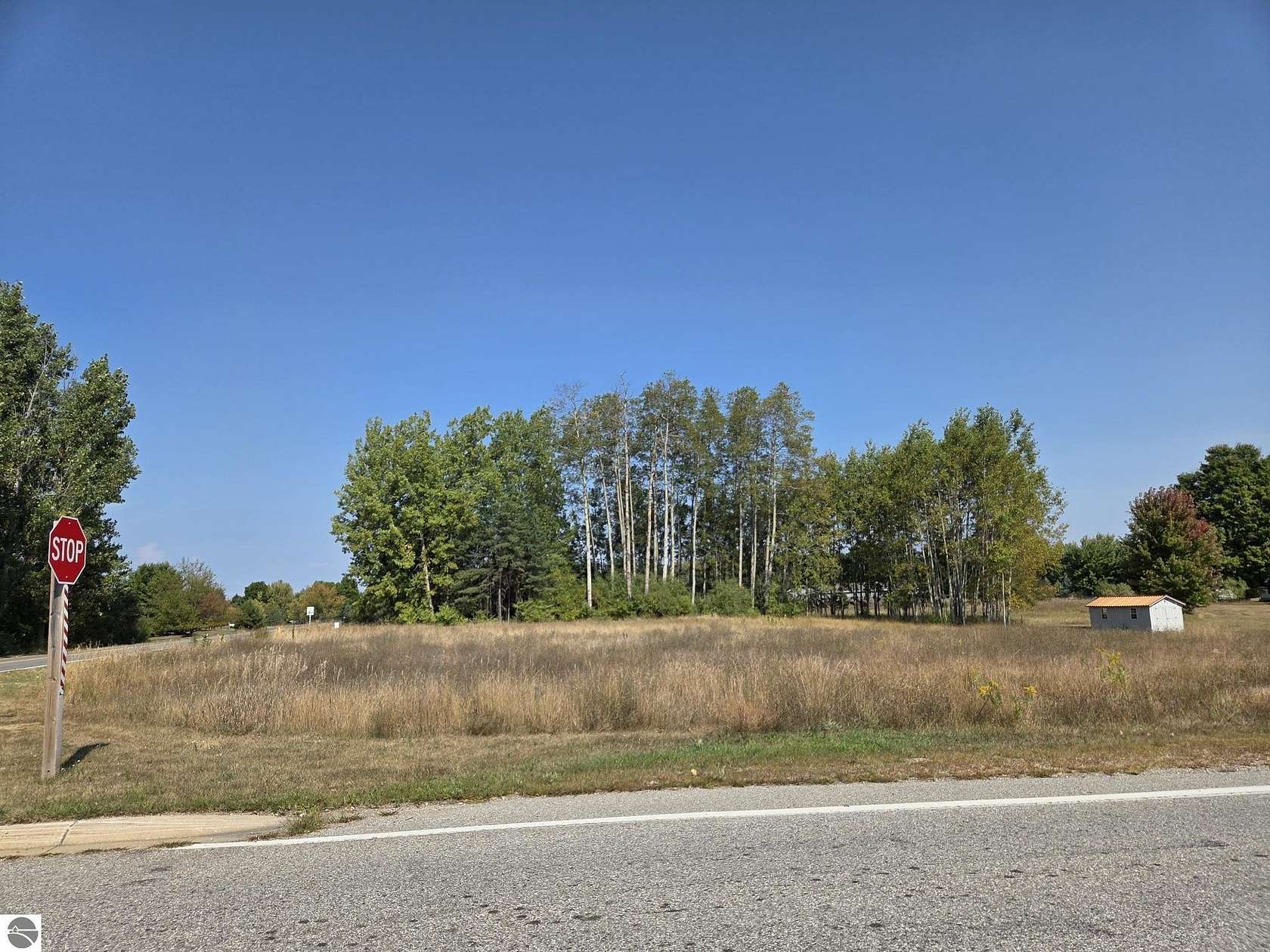 0.9 Acres of Land for Sale in Weidman, Michigan