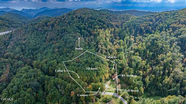 3.8 Acres of Residential Land with Home for Sale in Flag Pond, Tennessee