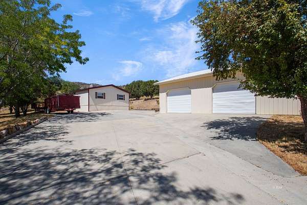 1.5 Acres of Residential Land with Home for Sale in Spring Creek, Nevada