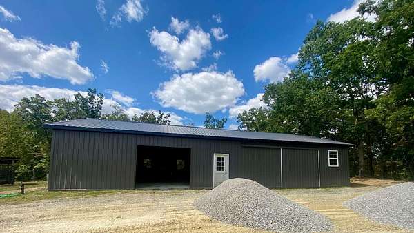 12.4 Acres of Land with Home for Sale in Crab Orchard, Kentucky