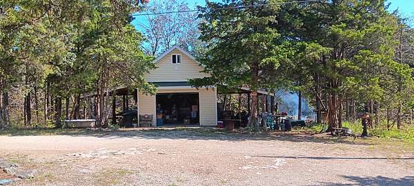 50 Acres of Recreational Land with Home for Sale in Wheatland, Missouri