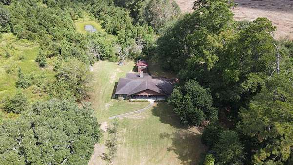 10.4 Acres of Land with Home for Sale in Buna, Texas