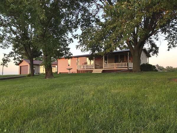 31.1 Acres of Land with Home for Sale in Clifton Hill, Missouri