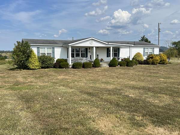 10.8 Acres of Land with Home for Sale in Flemingsburg, Kentucky