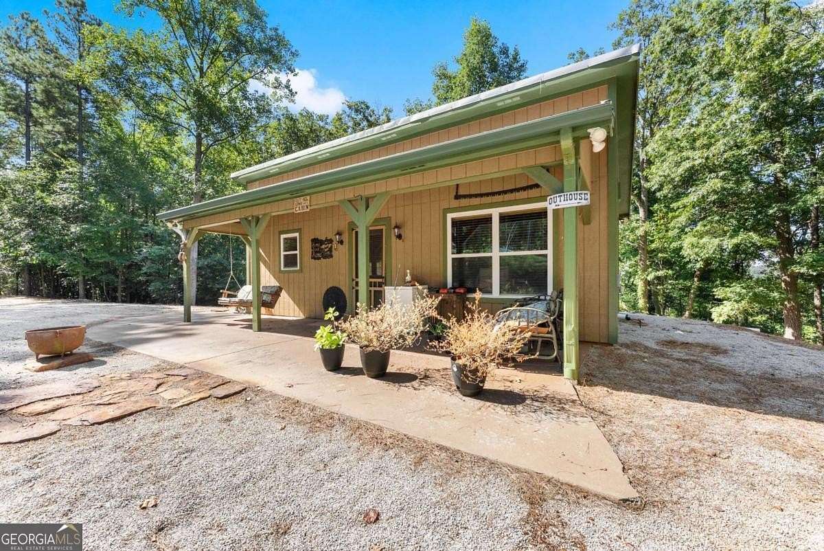 9.3 Acres of Residential Land with Home for Sale in Royston, Georgia