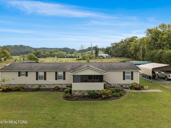 10.7 Acres of Land with Home for Sale in Spring City, Tennessee