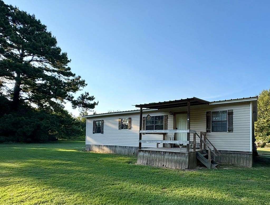 5 Acres of Residential Land with Home for Sale in Huntington, Texas